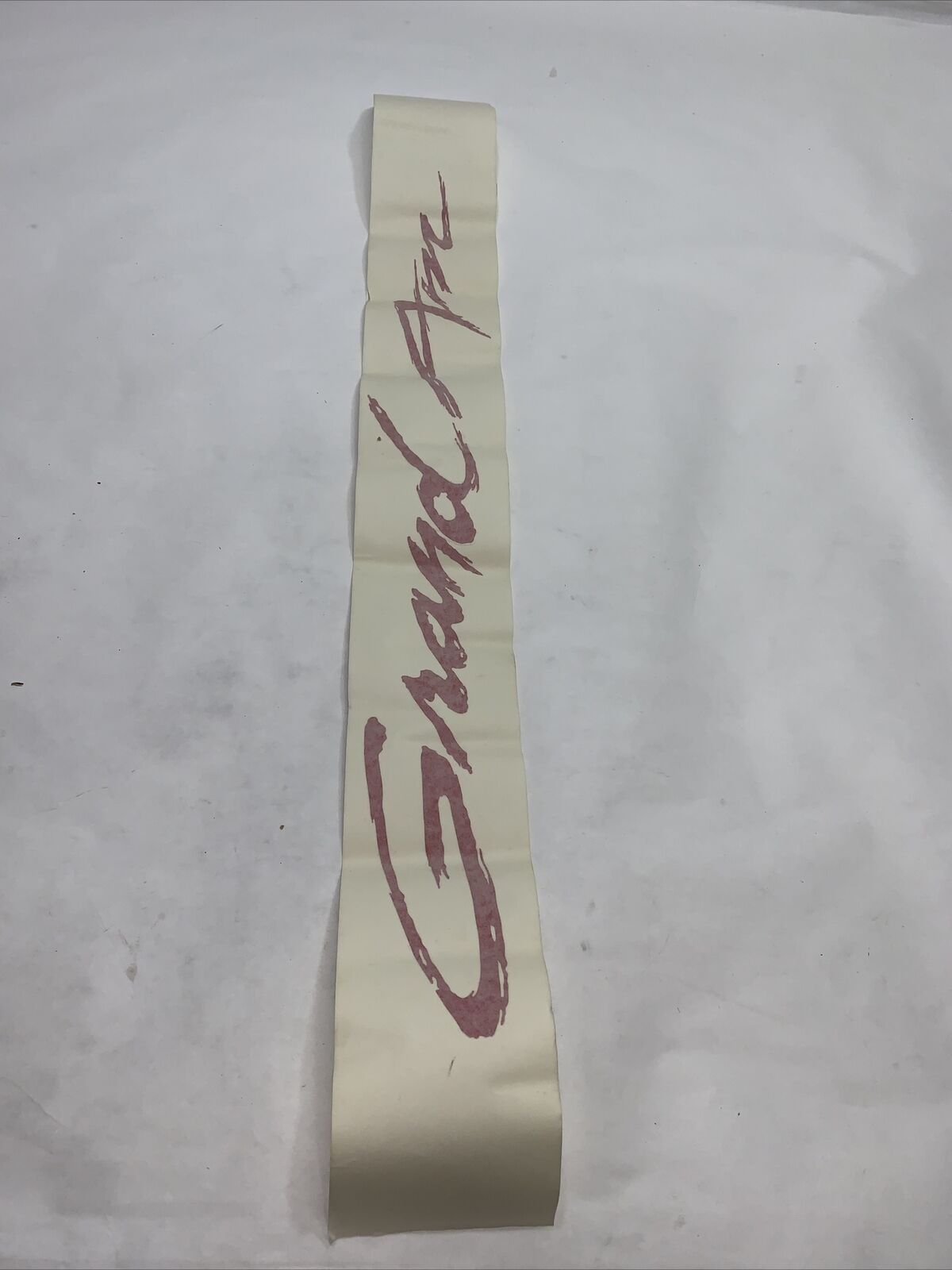 New OEM GM GrandAM Decal Windshield Decal RED 12342815