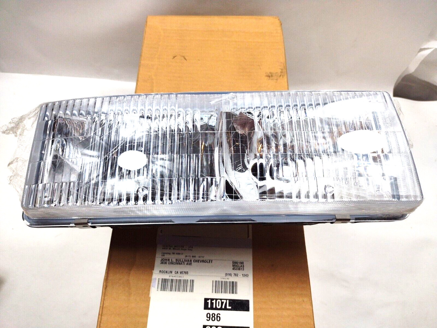 Genuine OEM GM Passenger Side Headlamp 1995-2005 Chevrolet Astro 16524092