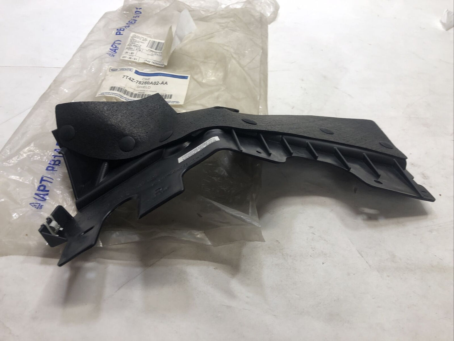 New OEM Genuine Ford 07-15 Passenger Side (RH) Bumper Filler 7T4Z-78280A02-AA