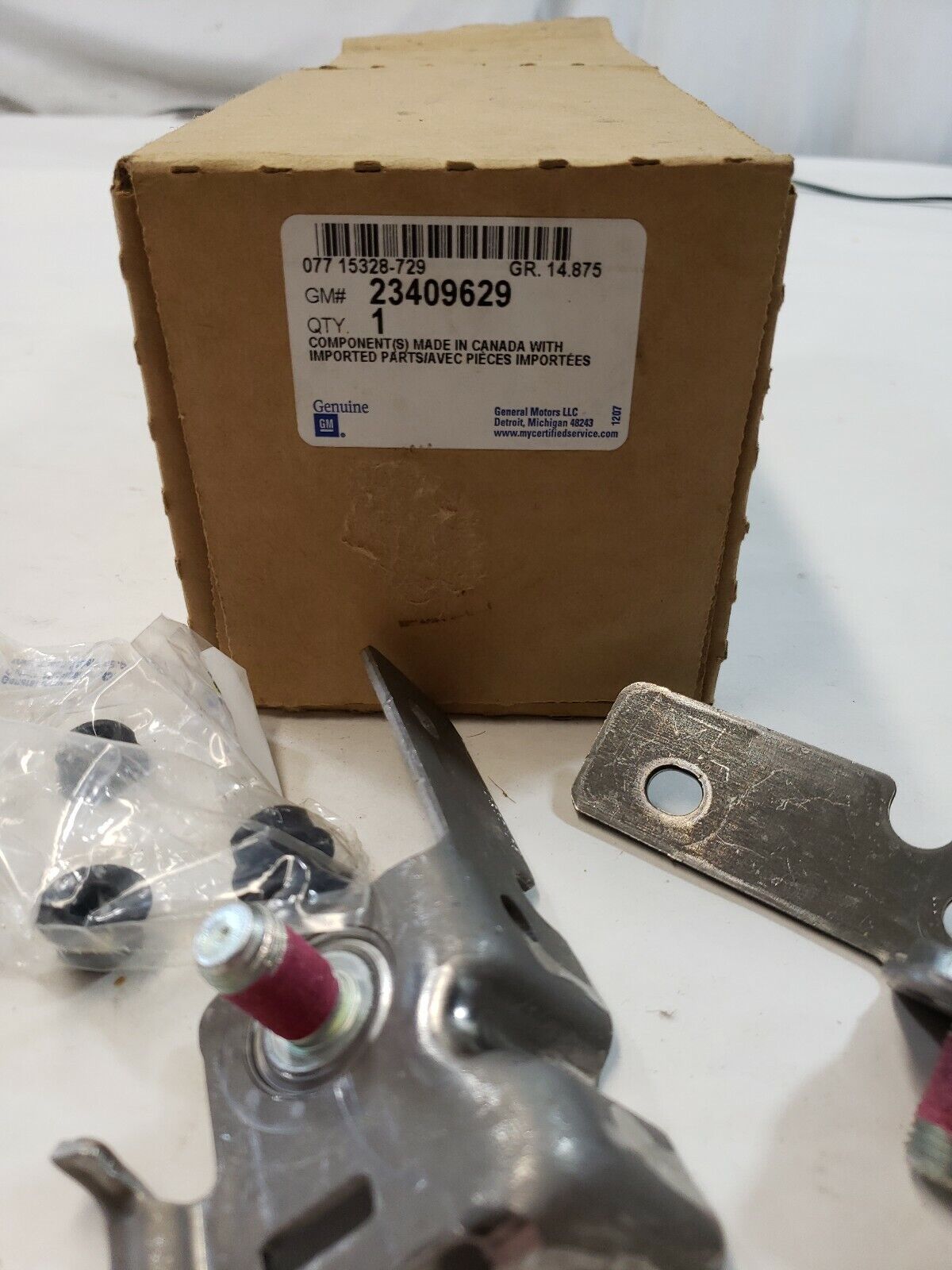 New OEM GM Belt Brackets 23409629