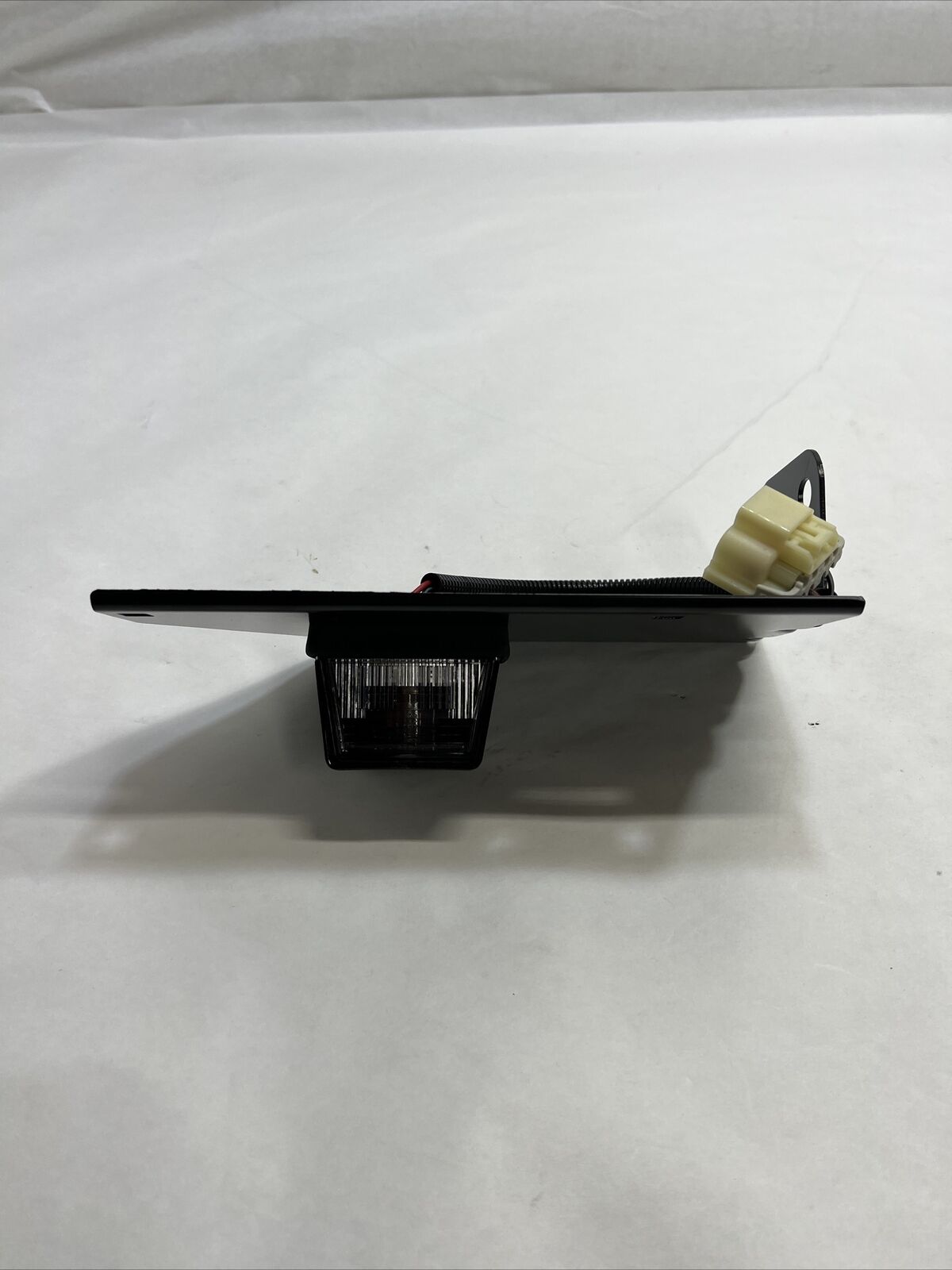 New OEM Genuine GM Rear License Plate Lamp with Bracket & Harness 15048278