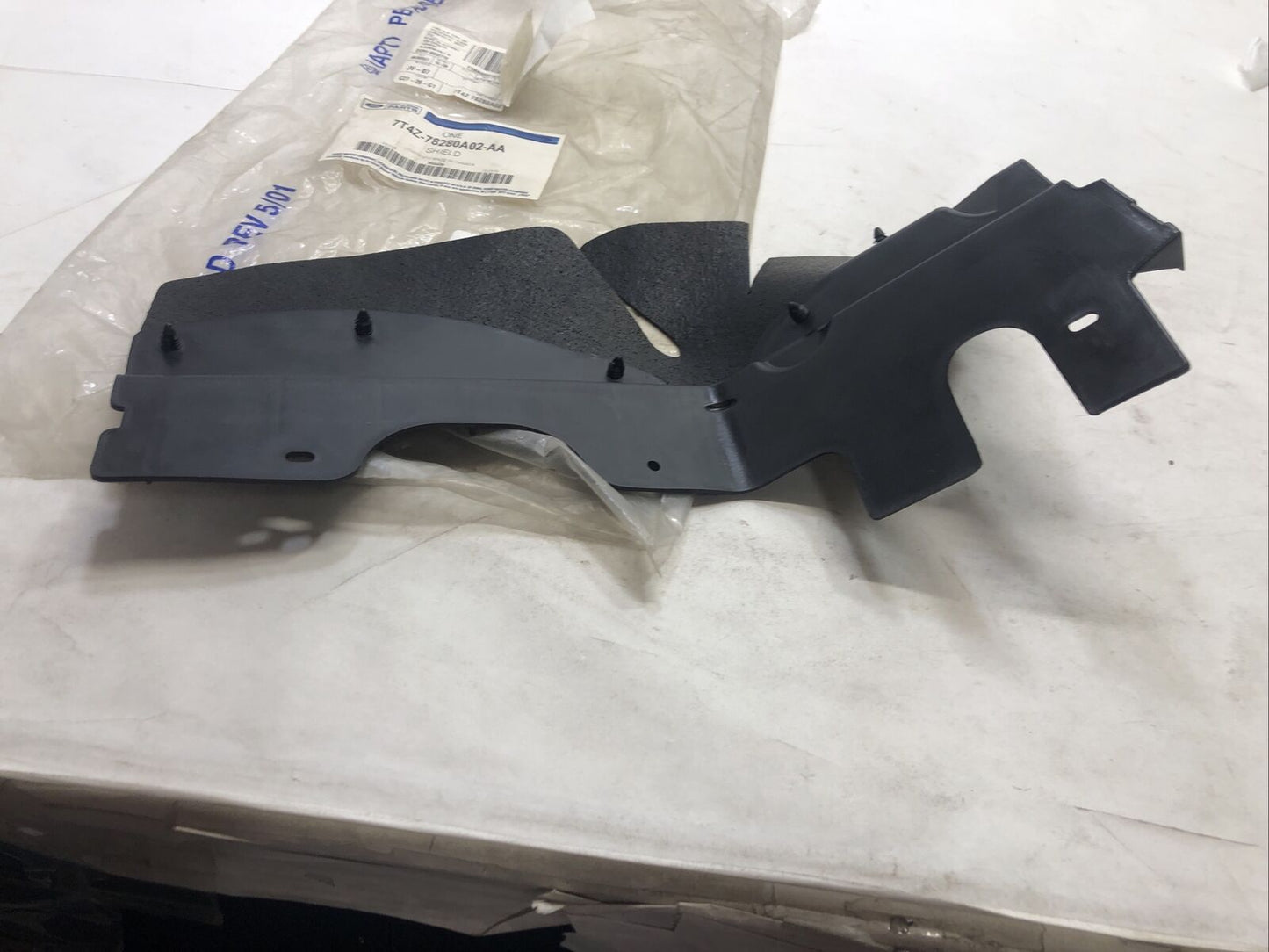 New OEM Genuine Ford 07-15 Passenger Side (RH) Bumper Filler 7T4Z-78280A02-AA