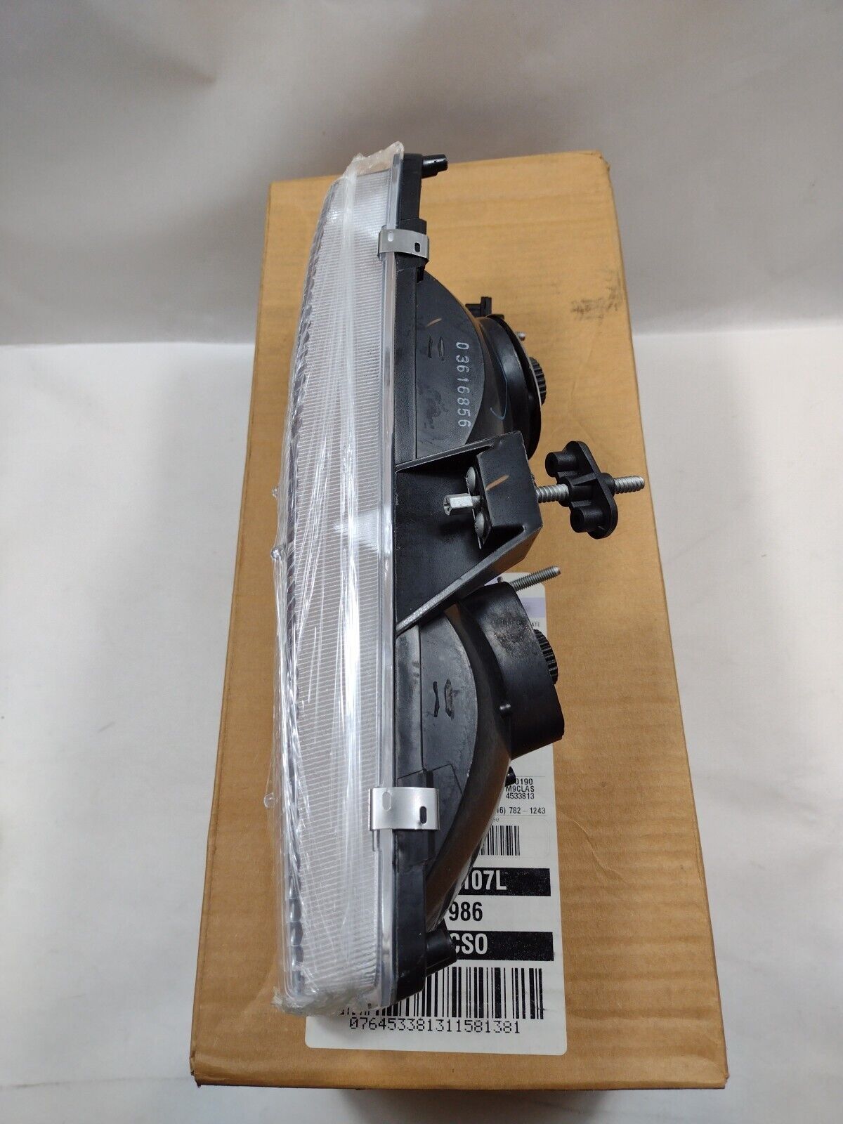 Genuine OEM GM Passenger Side Headlamp 1995-2005 Chevrolet Astro 16524092